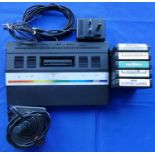 An Atari 2600 Games console S No X72C3313321 complete with power supply, joystick, TV lead and