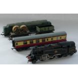 A Hornby-Dublo British Railways 80054, a Hornby-Dublo British Railways, a Hornby carriage, and two