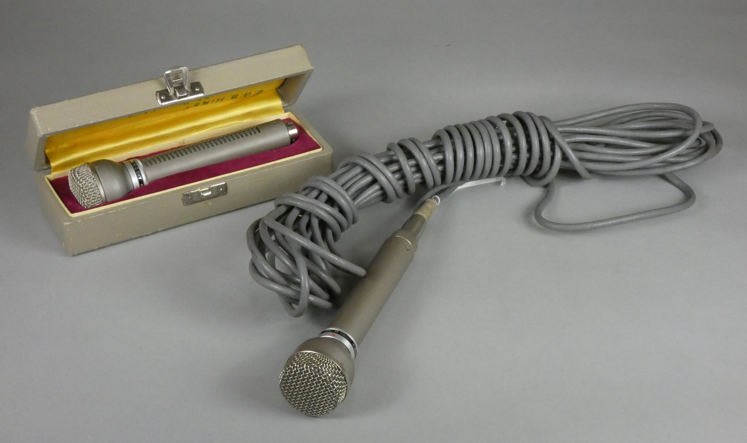 An AKG D19 microphone in original box together with another AKG D19