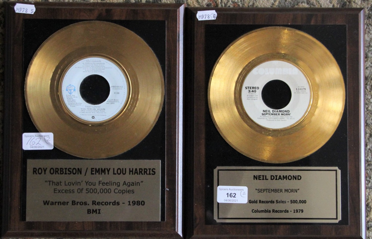 A mounted copy of gold disc presented to Roy Orbison/ Emmy Lou Harris for sales of 500.000 copies of