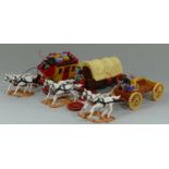 A set of three 1970's plastic models of horse drawn stage coaches by 'Timpo Toys' (3)