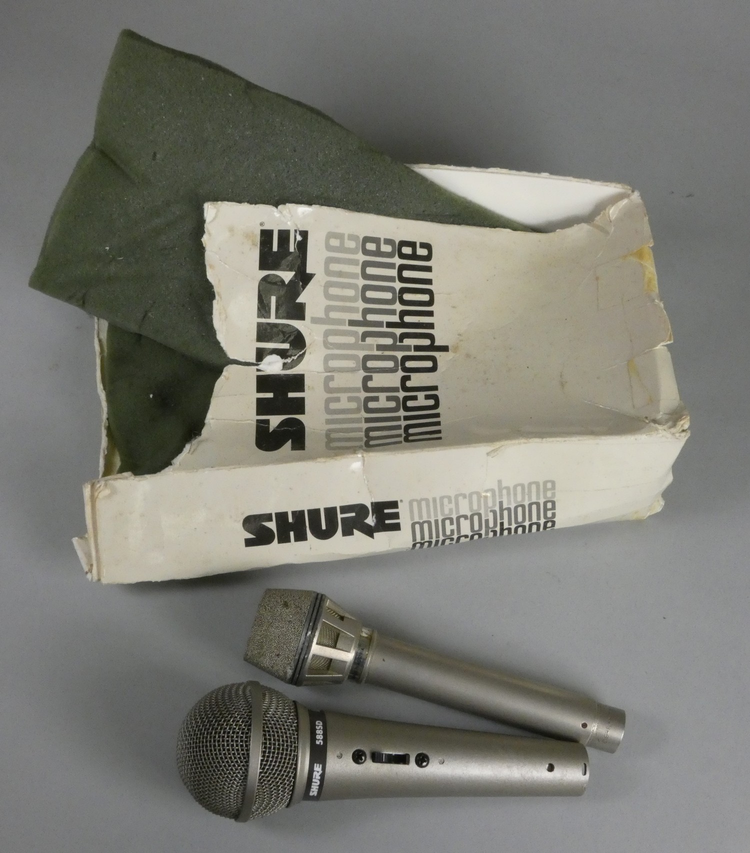 A Shure unisphere microphone 588SD, together with a AKG D190E Austrian made microphone with