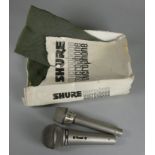 A Shure unisphere microphone 588SD, together with a AKG D190E Austrian made microphone with