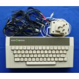 An Acorn electron computer with power pack & TV leads.