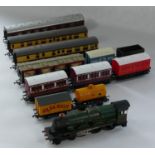 A Hornby-Dublo 'Denbigh Castle' 7032 locomotive together with, five carriages and a variety of
