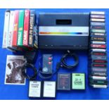 An Atari 7800 games console X 1093110598 with TV power supply, controller together with boxed &