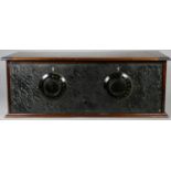 A wood cased radio from 1920's - has two BBC marked valves. Two adjustment knobs, patterned