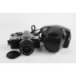 A Olympus OM10 SLR Film Camera w/ Olympus OM-System 50mm F/1.8 Lens & Case