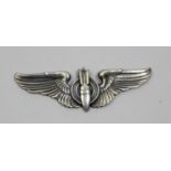 A silver WWII USAAF Bomb Aimer wings badge, 1939-45.