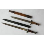 A Lee Enfield 1888 pattern short bayonet, blade length 30 cm, with leather and steel scabbard and