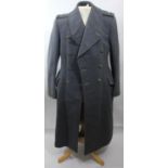 An RAF great coat, 42cm across the shoulders with Volunteer Reserve Training pips, together with a