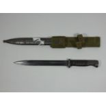 A German Wehrmacht K/98 Mauser bayonet, 25cm straight fullered blade, stamped 40 cof, 9852, two-