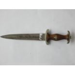 A German reproduction Third Reich SA dagger, the wooden handle with Nazi eagle, and nickel plated