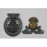 A German WWII Kriegsmarine High Sea badge, by Friedrich Orth, together with a The Lancashire