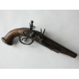 A mid 18th century Flintlock double barrel pistol, with 7" inch barrels, carved stock, lacking