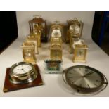 A collection of clocks to include, a Koma anniversary clock, Buckingham quartz carriage clock and