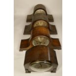 A collection of clocks to include, large wooden manual wind mantel clocks, a wall hanging mantel