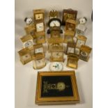 A collection of clocks to include, Wellco quartz mantel clock, a Metamec marble/wood quartz clock,