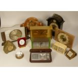 A collection of clocks to include, a Smiths marble electric clock, a Longines dome clock, a