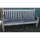 A hardwood garden bench. 182cm long.