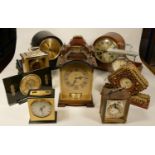 A collection of clocks to include, a Tempus Fugit Kundo mega-quartz mantel clock, a Smiths battery