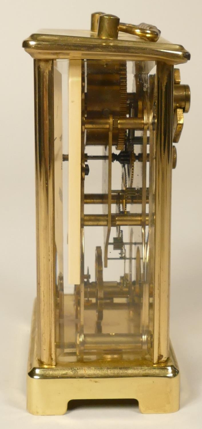 A Schatz 8 day, brass carriage time piece with visible escapement, together with another similar - Image 8 of 9