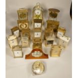 A collection of clocks to include, H. Samuel carriage clock together, with other carriage and
