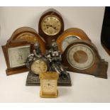 A collection of clocks to include, a Juliana bronze effect quartz clock, a London Clock Co. quartz