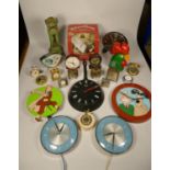 A collection of clocks to include, a Mickey Mouse alarm clock, a Wallace and Gromit talking radio