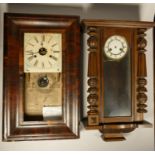 Three large wooden wall clocks