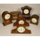 A collection of mahogany mantel clocks to include, Kemp Bros Union Street- Elliot Clock