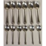 A silver set of Art Deco coffee spoons, Birmingham 1935 and a silver set of fancy tea spoons,