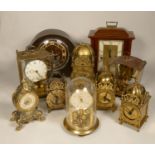 A collection of clocks to include, brass lantern clocks, Kern anniversary clock, Franz Hemle &