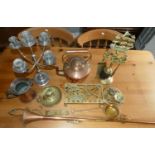 A collection of brass & copper wares to include, trivets, kettle, jug, horn, plated five branch