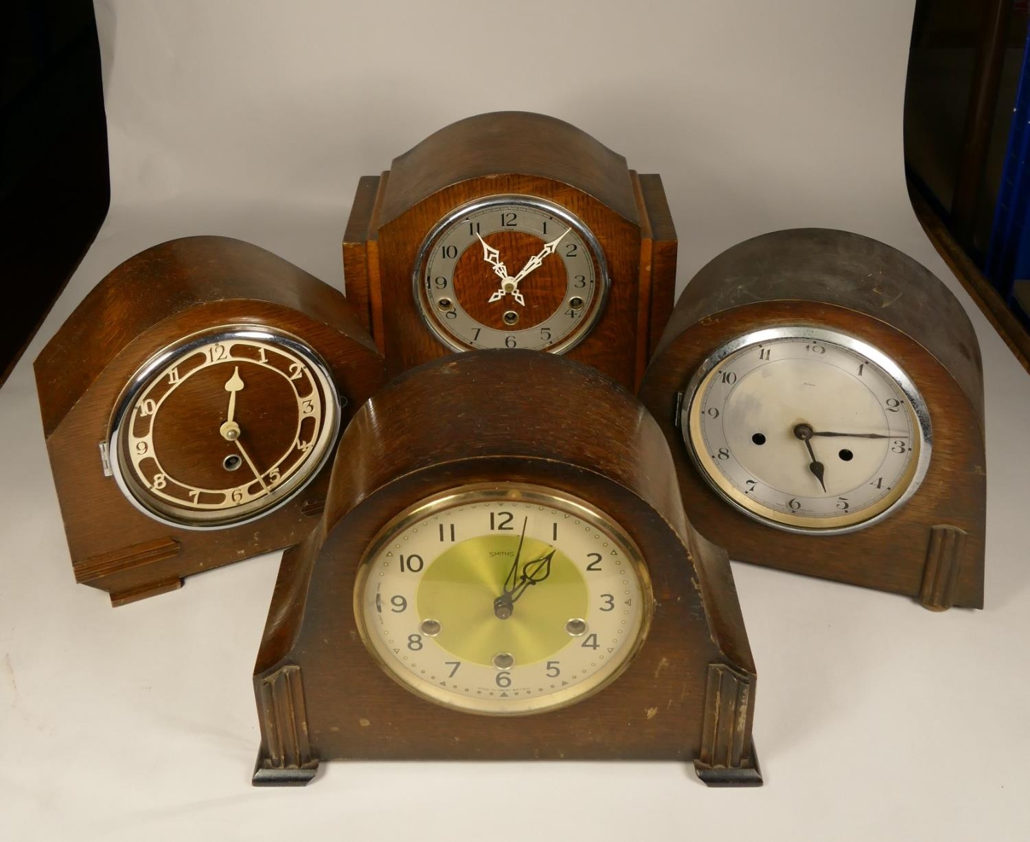 A collection of clocks to include, Enfield wooden mantel clock, Smiths wooden mantel clock, together