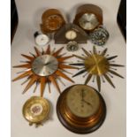 A collection of clocks to include, Kienzle automatic wall clock, a Metamec sunburst wall clock, a