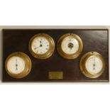 A FCC, precision, a combination thermometer, quartz clock, barometer, humidity bulk head