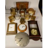 A collection of clocks to include, a Smiths Setric wooden electric clock, a quartz wall clock with a