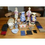 A musical Toby jug, a pair of continental figurines, a selection of tea & dinnerware by Doulton,