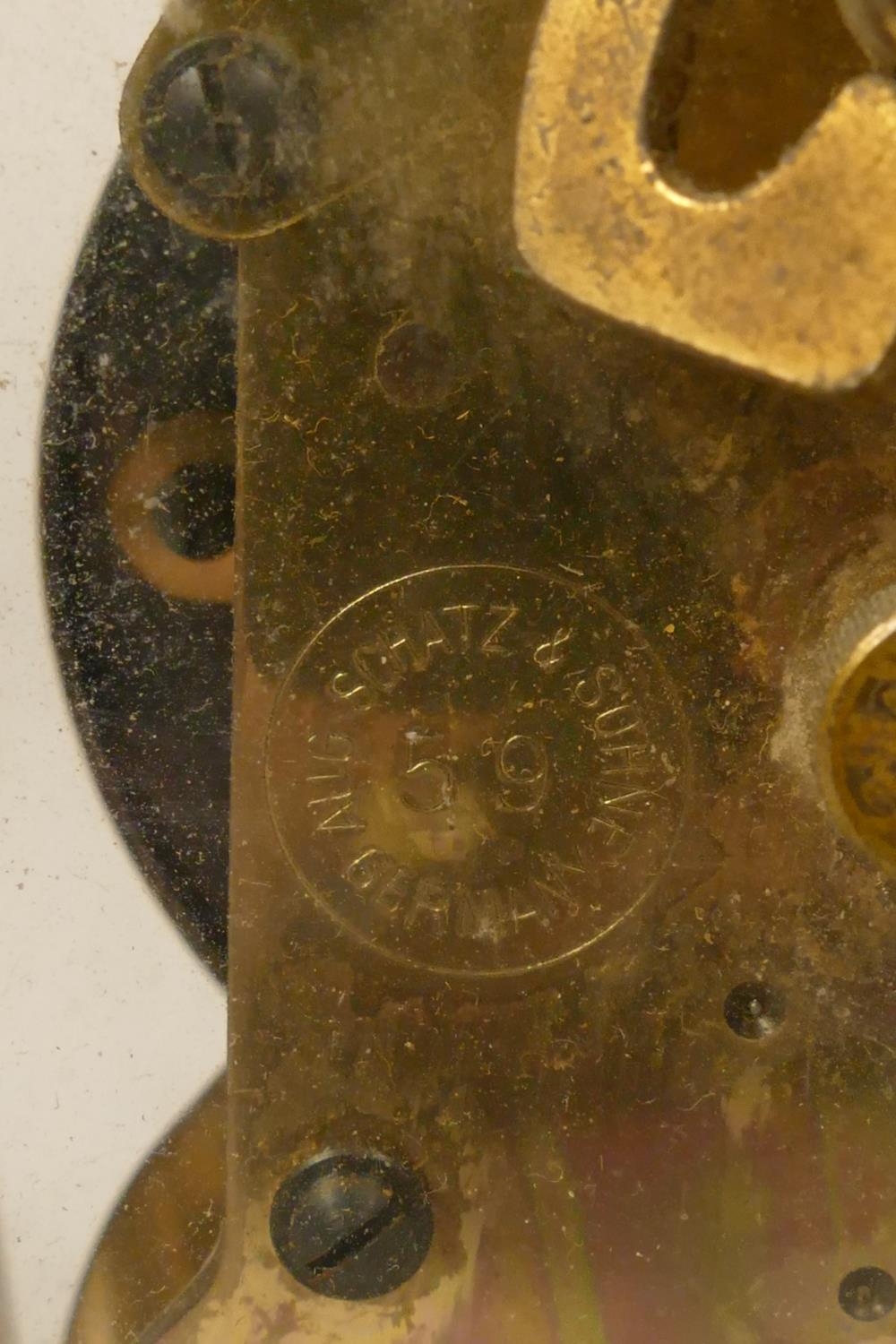 A Schatz 8 day, brass carriage time piece with visible escapement, together with another similar - Image 4 of 9