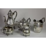 A Victorian electroplated three piece coffee service, an EPBM tea pot and a large milk jug