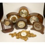 A collection of clocks to include, a History Craft wall clock, together with mantel clocks