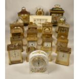 A collection of clocks to include, a Timemaster quartz mantel clock, an Aynsley quartz clock,