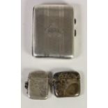 Two silver vesta cases, Birmingham 1898, 1903 and a cigarette case 1915, 3.5oz.