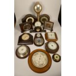 A collection of clocks to include, wooden mantel clocks and barometers