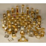 A collection of miniature quartz clocks to include, grandfather clocks, alarm clocks, rocking