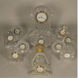 A collection of clocks to include, Waterford crystal mantel clocks, Edinburgh crystal mantel