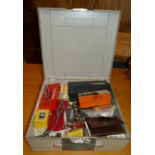 A quantity of model making accessories to include, tools, vice, paints, model plans, and a part