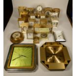 A collection of clocks to include, a Legend wall clock together with, quartz carriage and