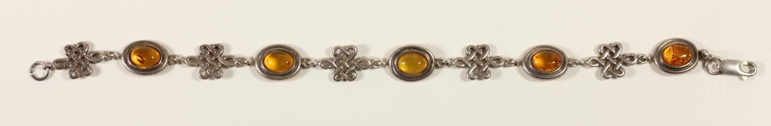 A silver and amber pendant, bracelet with matching ear rings and two pairs of ear rings - Image 3 of 7